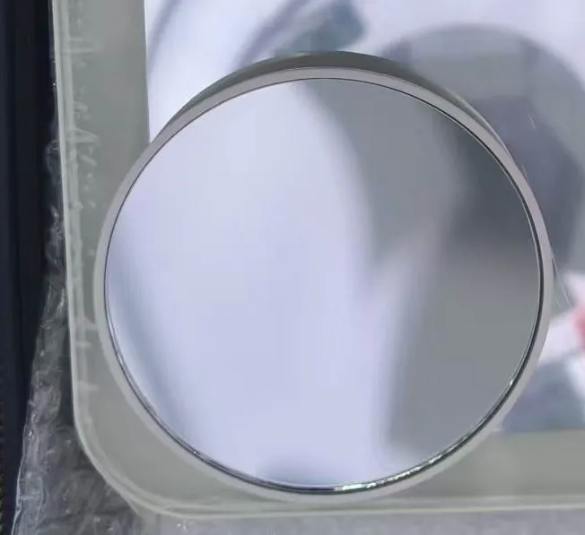 Close-up of the magnetic 5× accessory mirror attached at the edge of the GZM2 main mirror